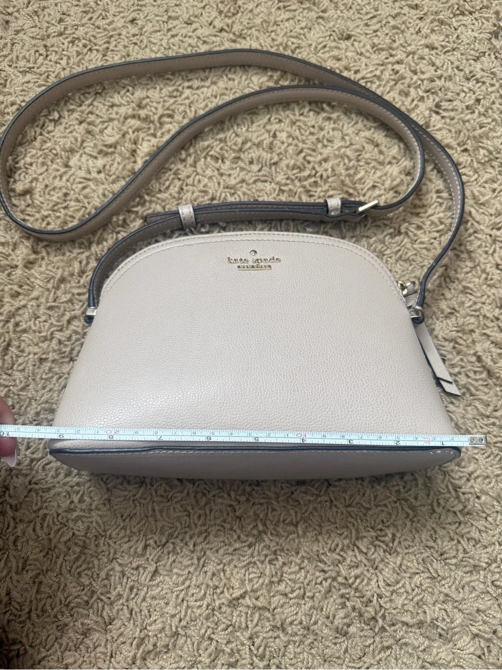kate spade pebble leather dome crossbody in light taupe